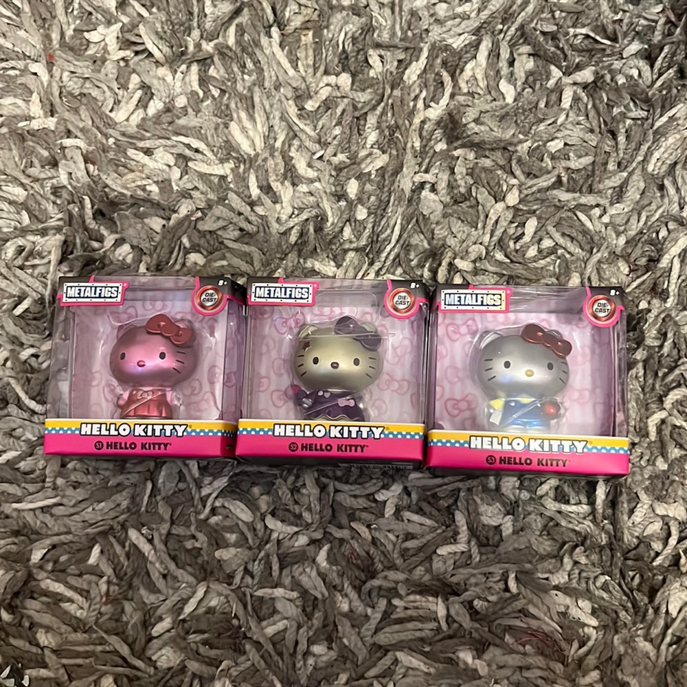 3 Hello Kitty metal figs collectables